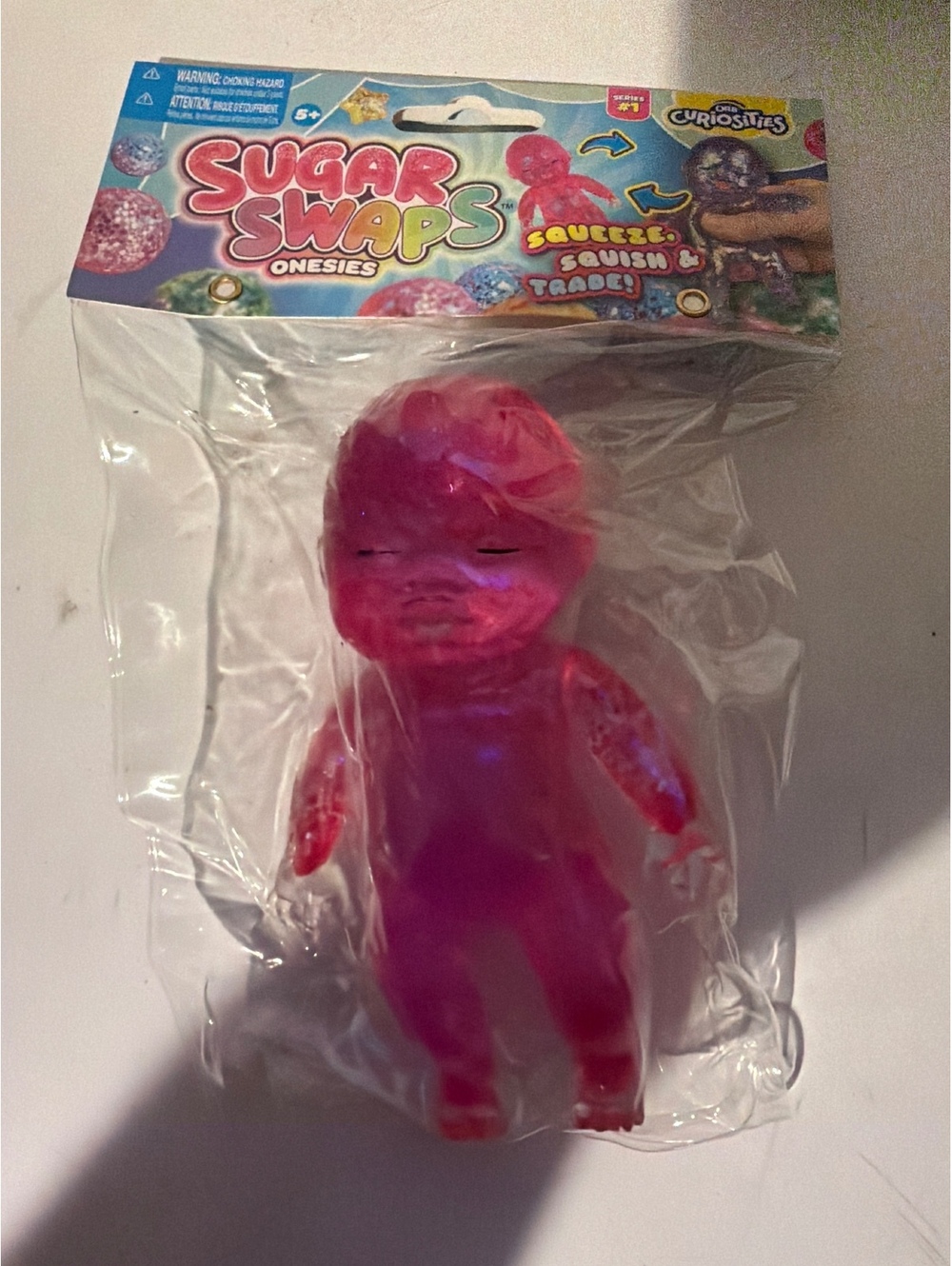 Sugar Swaps Onesies Squeeze Squish & Trade Pink Baby Doll Toy